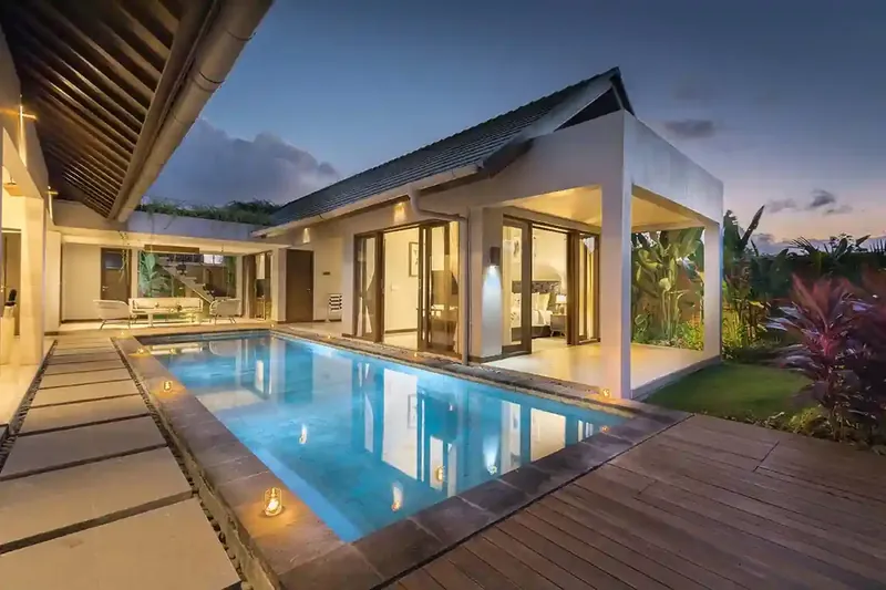 Villa pool at night in Ungasan