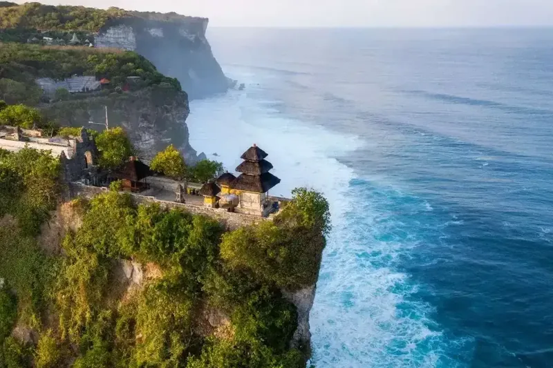 Uluwatu temple on the cliff edge above the Indian Ocean